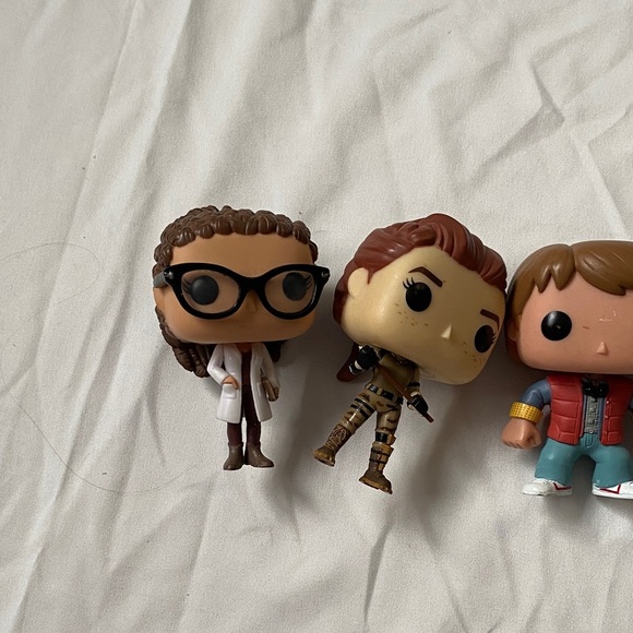 Funko Collectible Figures with Black, Brown, Red, and Blue Accents - Picture 2 of 16